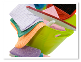 picture of green bucket with various colored micro-fiber towels used for green cleaning